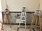 تصاویر/نمایشگاه عکس شهدای مدافع حرم در شهرستان صحنه برپا شد